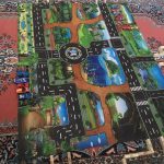 Žaidimų kilimėlis su miesto vaizdais photo review
