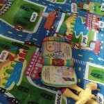 Vaikiškas kilimas su miesto vaizdais photo review